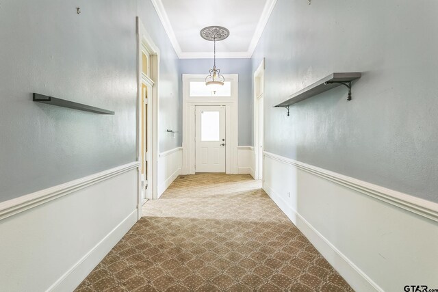 293 S Barron, Rusk, TX 75785 - entryway featuring crown molding and baseboards