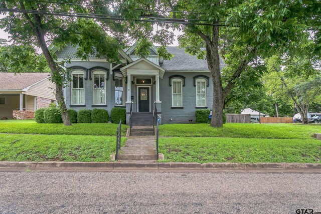 293 S Barron, Rusk, TX 75785 - view of front of property with a front lawn and crawl space