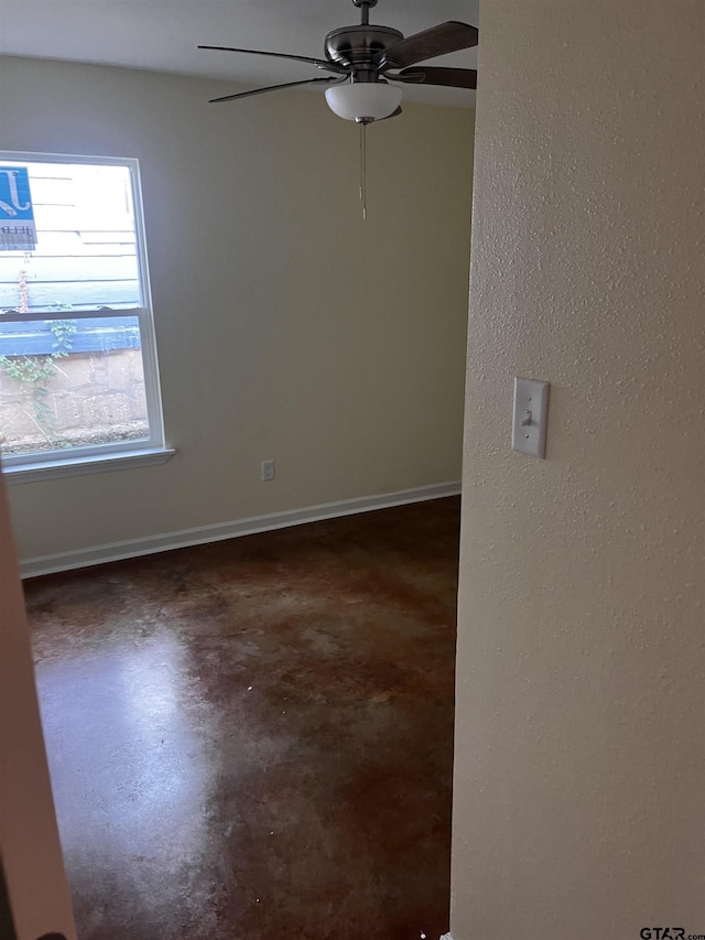 spare room featuring ceiling fan