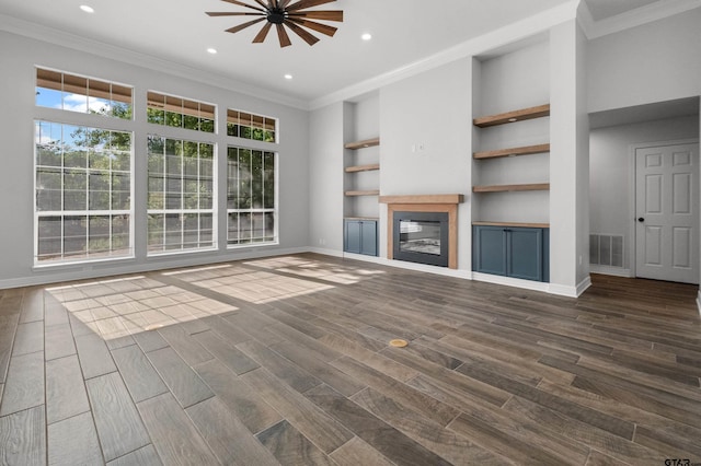 unfurnished living room featuring recessed lighting, visible vents, a ceiling fan, crown molding, and baseboards
