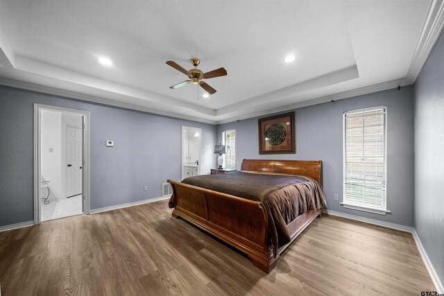 1261 Luann Ln, Tyler, TX 75703 - living room with ornamental molding, light wood-type flooring, ceiling fan, a brick fireplace, and baseboards