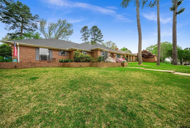 1261 Luann Ln, Tyler, TX 75703 - spare room featuring visible vents, wood finished floors, baseboards, and ornamental molding