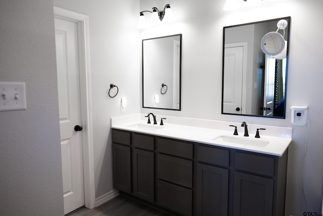 1420 Allison Ln, Lindale, TX 75771 - bathroom featuring double vanity and baseboards