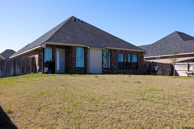 1420 Allison Ln, Lindale, TX 75771 - rear view of property featuring brick siding and a shingled roof