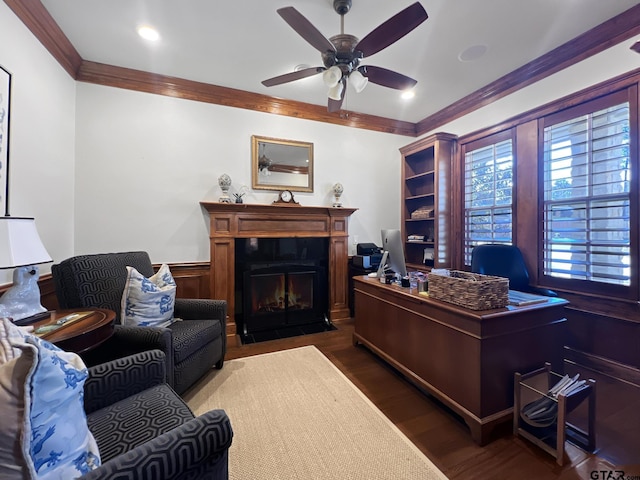 office space with crown molding, ceiling fan, dark hardwood / wood-style flooring, and wood walls