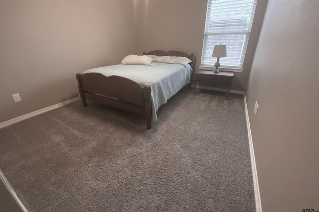5848 Grace Ave, Tyler, TX 75707 - bedroom with carpet flooring and baseboards