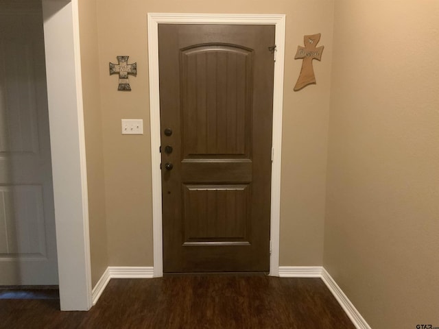 5848 Grace Ave, Tyler, TX 75707 - doorway with baseboards and wood finished floors