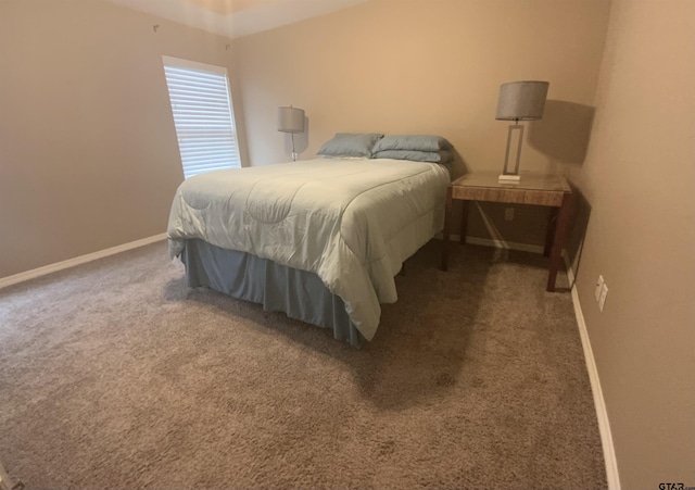 5848 Grace Ave, Tyler, TX 75707 - carpeted bedroom featuring baseboards