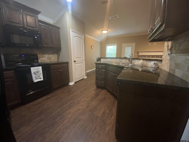 5848 Grace Ave, Tyler, TX 75707 - kitchen featuring black appliances, a sink, ornamental molding, tasteful backsplash, and baseboards