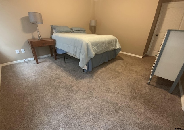 5848 Grace Ave, Tyler, TX 75707 - bedroom with carpet and baseboards
