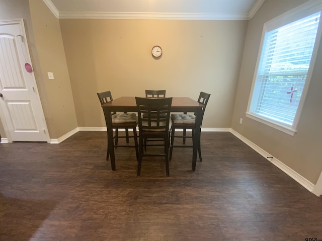 5848 Grace Ave, Tyler, TX 75707 - dining room with dark wood-style flooring, ornamental molding, and baseboards