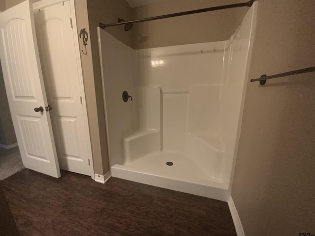 5848 Grace Ave, Tyler, TX 75707 - full bathroom featuring baseboards and a shower