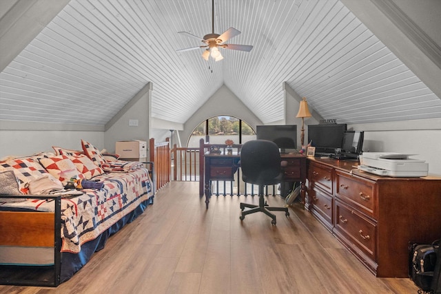 bedroom featuring vaulted ceiling and wood finished floors