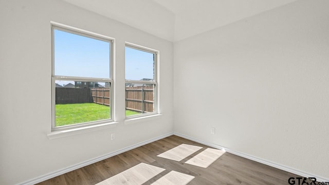 490 Burnett Trl, Canton, TX 75103 - spare room featuring wood finished floors and baseboards