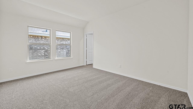 490 Burnett Trl, Canton, TX 75103 - carpeted spare room with lofted ceiling and baseboards
