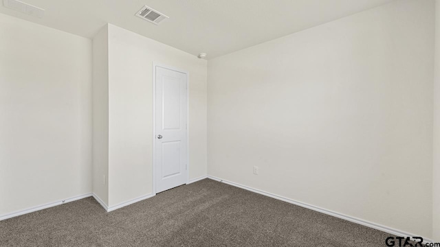 490 Burnett Trl, Canton, TX 75103 - empty room featuring dark carpet and baseboards