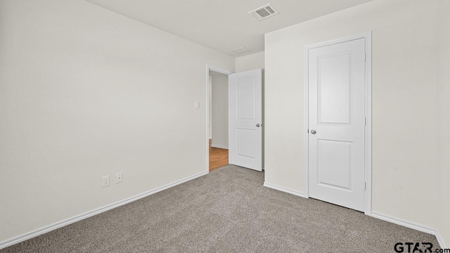 490 Burnett Trl, Canton, TX 75103 - unfurnished bedroom featuring carpet and baseboards