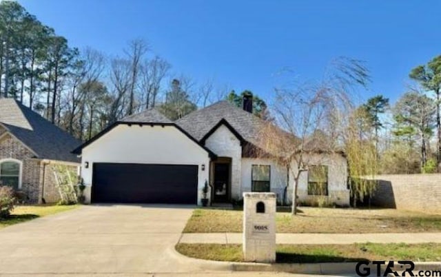 view of front of home with a garage