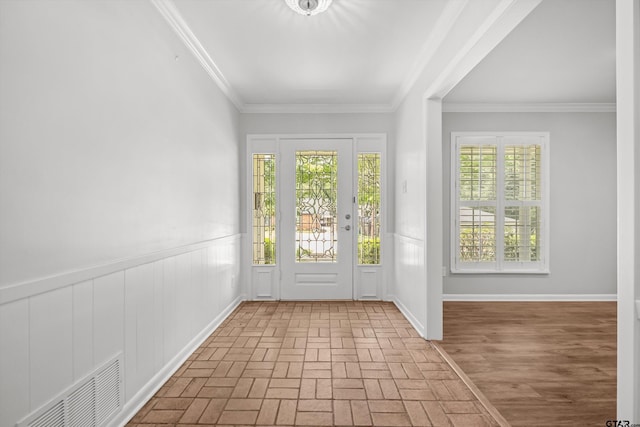 3316 S Cameron Ave, Tyler, TX 75701 - entryway with brick flooring, crown molding, and wainscoting