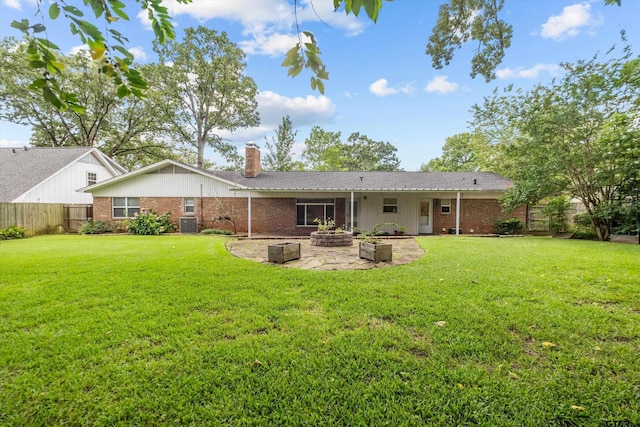 3316 S Cameron Ave, Tyler, TX 75701 - rear view of house featuring a patio area, a chimney, and brick siding