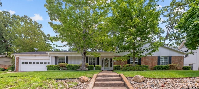 3316 S Cameron Ave, Tyler, TX 75701 - ranch-style house with brick siding, an attached garage, and a front lawn