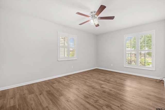 3316 S Cameron Ave, Tyler, TX 75701 - unfurnished room with wood finished floors and a ceiling fan