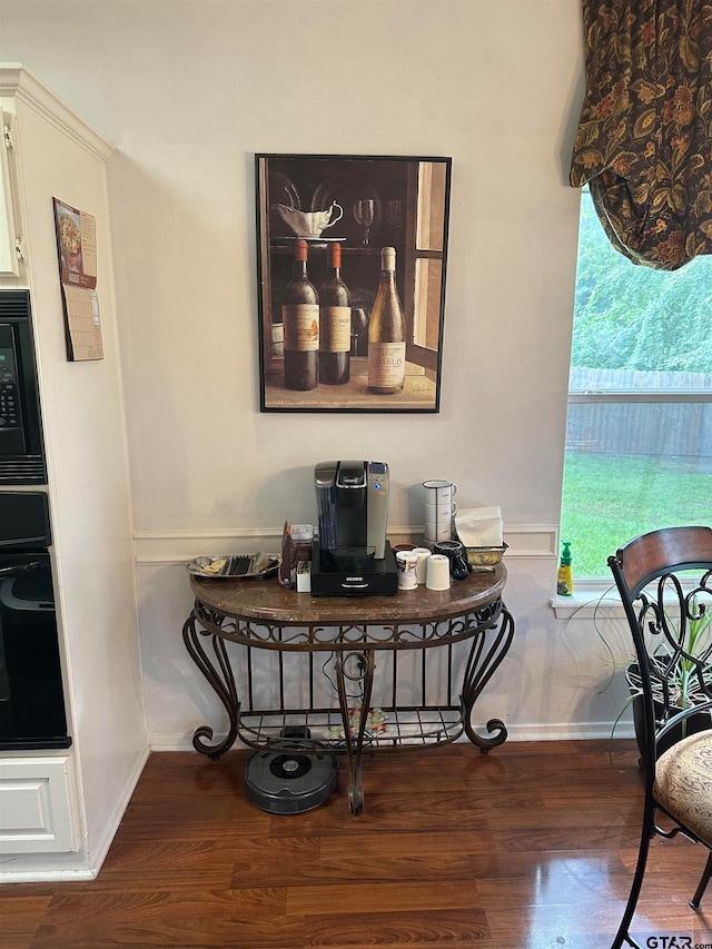 dining space featuring wood-type flooring