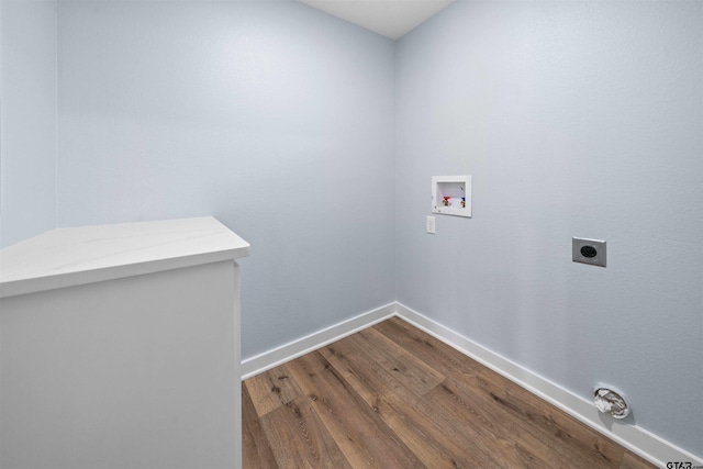 laundry area featuring hookup for a washing machine, electric dryer hookup, and wood-type flooring