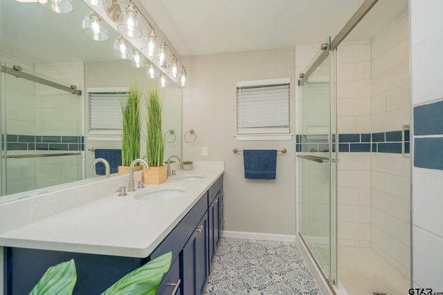 1021 N Montgomery St, Gilmer, TX 75644 - bathroom featuring double vanity, a shower stall, and tile patterned floors