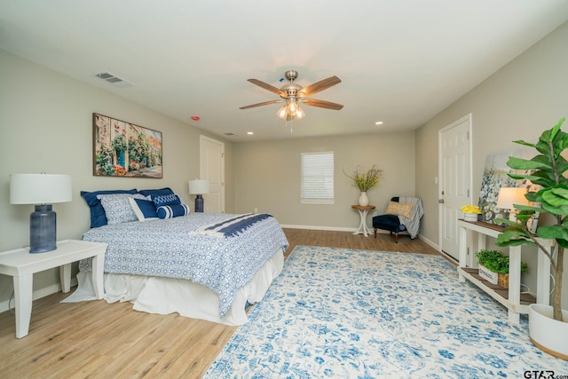 1021 N Montgomery St, Gilmer, TX 75644 - bedroom featuring wood finished floors, recessed lighting, and ceiling fan
