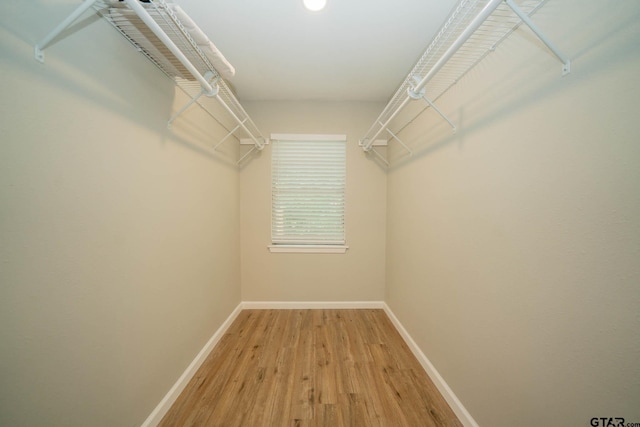 1021 N Montgomery St, Gilmer, TX 75644 - walk in closet featuring light wood-style flooring