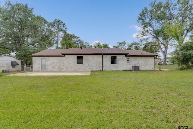 304 Hanks St, Whitehouse, TX 75791 - back of house with a patio and brick siding