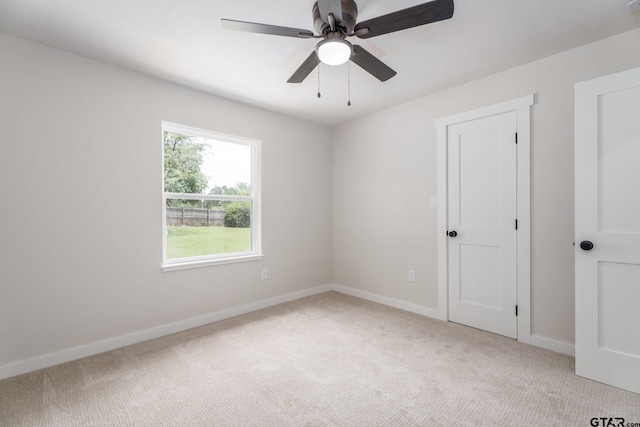 304 Hanks St, Whitehouse, TX 75791 - carpeted empty room with baseboards and ceiling fan