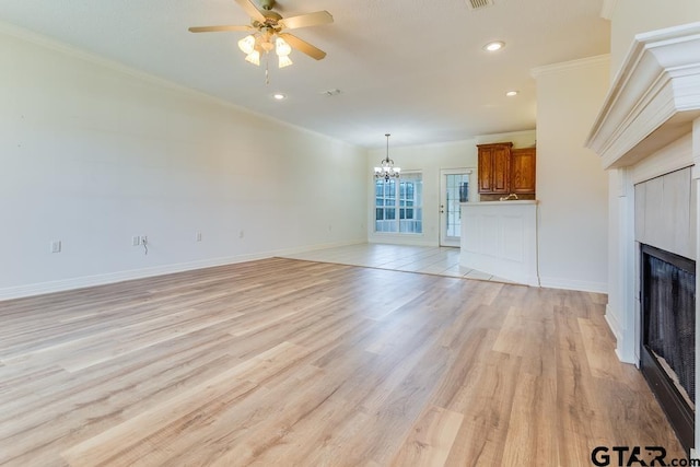 3425 Iberville Dr, Tyler, TX 75701 - unfurnished living room with a chandelier, a fireplace, a ceiling fan, light wood-style floors, and baseboards