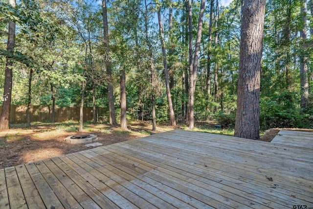 deck featuring an outdoor fire pit