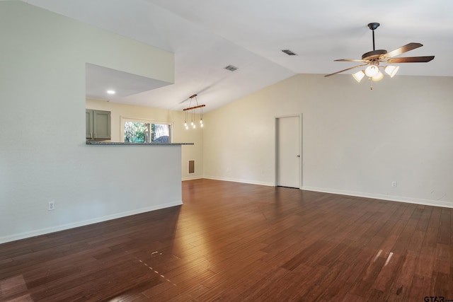 unfurnished living room with ceiling fan, dark hardwood / wood-style floors, and lofted ceiling