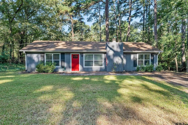 ranch-style home with a front yard