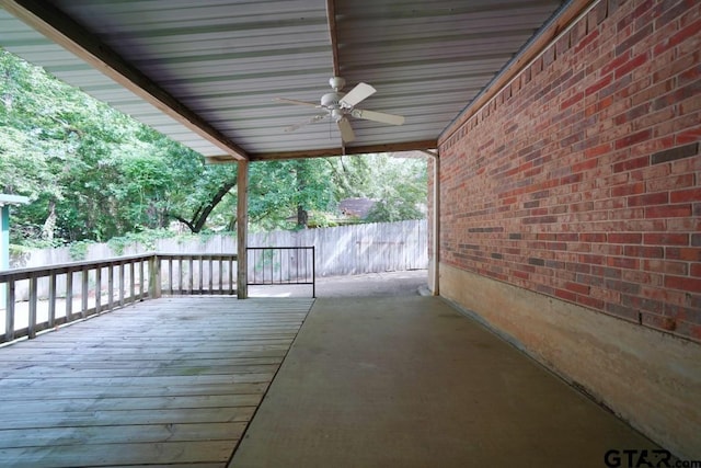 4505 Inverness, Tyler, TX 75703 - wooden terrace with ceiling fan and fence