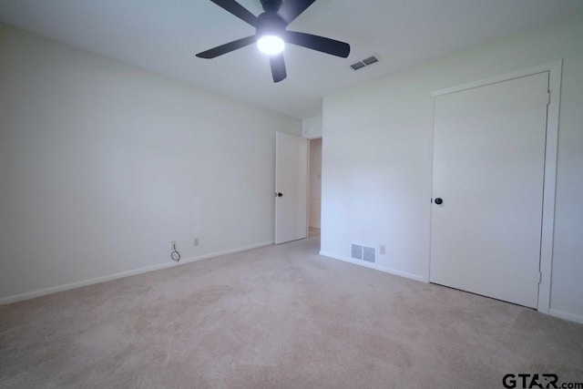 4505 Inverness, Tyler, TX 75703 - unfurnished bedroom featuring carpet floors, baseboards, and ceiling fan