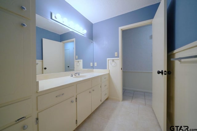 4505 Inverness, Tyler, TX 75703 - bathroom with tile patterned floors and vanity