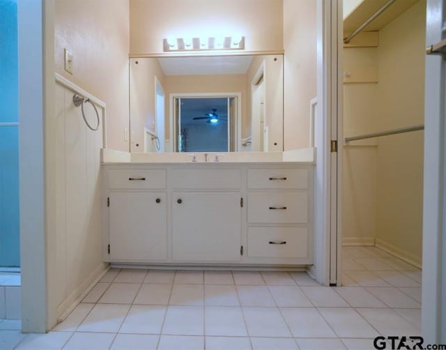 4505 Inverness, Tyler, TX 75703 - bathroom featuring vanity, a ceiling fan, and tile patterned flooring