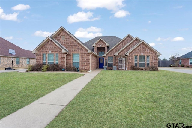 view of front of house with a front lawn