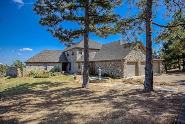 tudor home featuring a garage