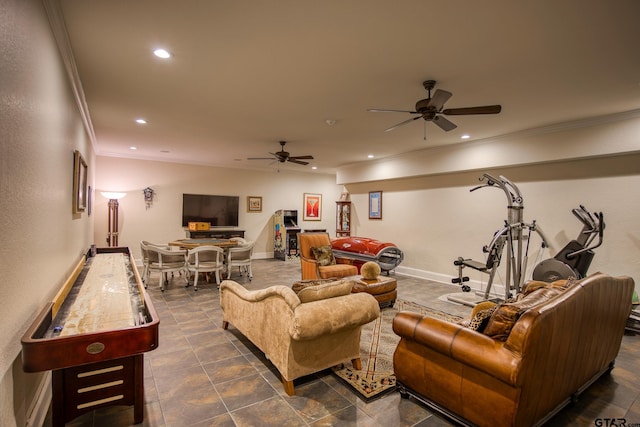 living room with ceiling fan and crown molding