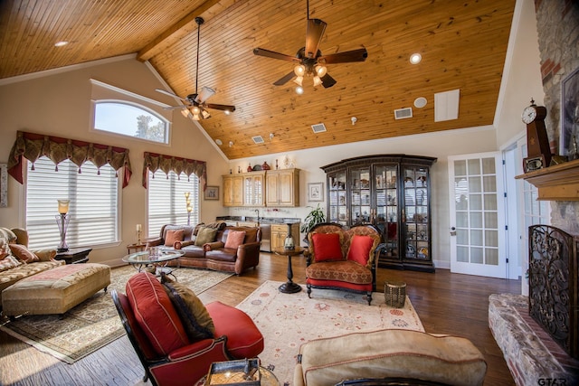 living room featuring wooden ceiling, high vaulted ceiling, a fireplace, beam ceiling, and wood-type flooring