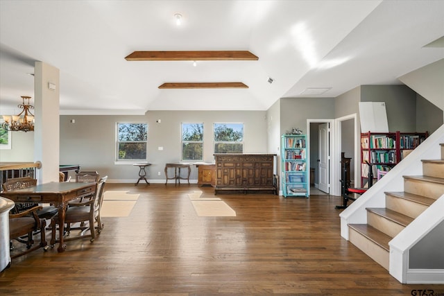 interior space with a notable chandelier, vaulted ceiling with beams, and dark hardwood / wood-style floors