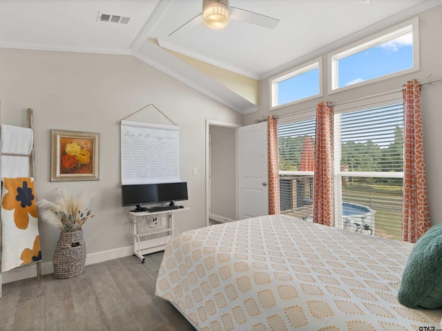 bedroom featuring wood-type flooring, vaulted ceiling, ornamental molding, and ceiling fan