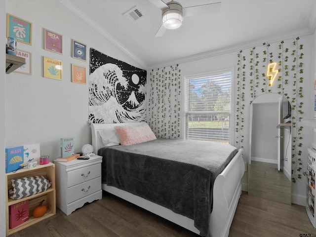 bedroom featuring ornamental molding and dark hardwood / wood-style floors