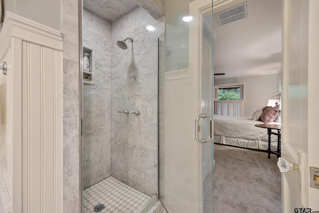 bathroom featuring visible vents, connected bathroom, and a stall shower