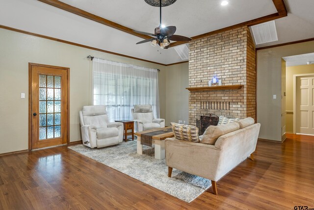 410 Shande St, Whitehouse, TX 75791 - living area featuring ceiling fan, baseboards, ornamental molding, a fireplace, and wood finished floors